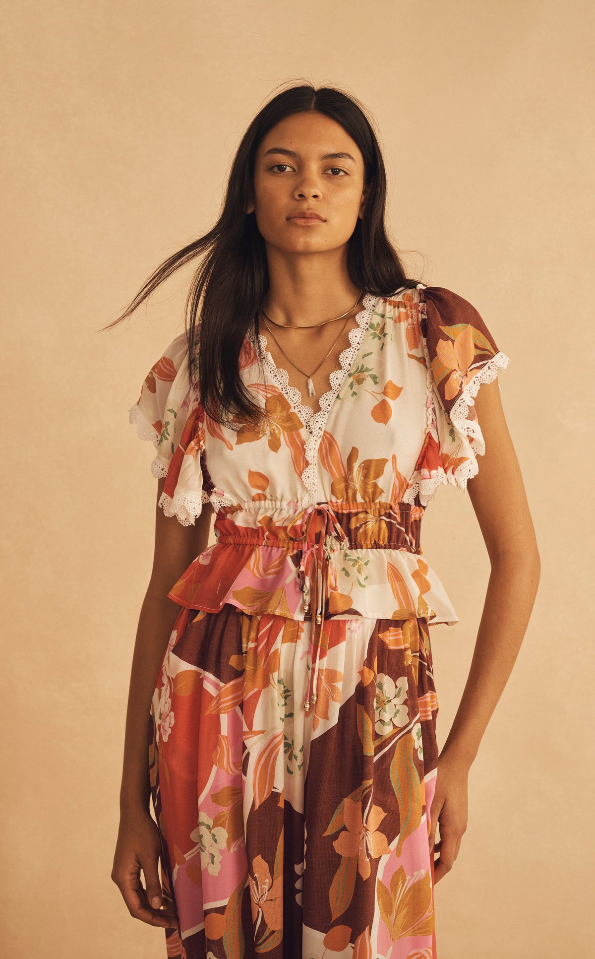 The look: LUCCA Silk Ruffle Sleeve Drawstring Top