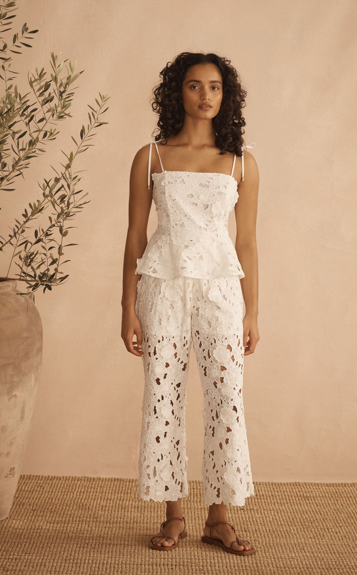 The look: BIANCA ORNATO Appliqué Tie Peplum Top